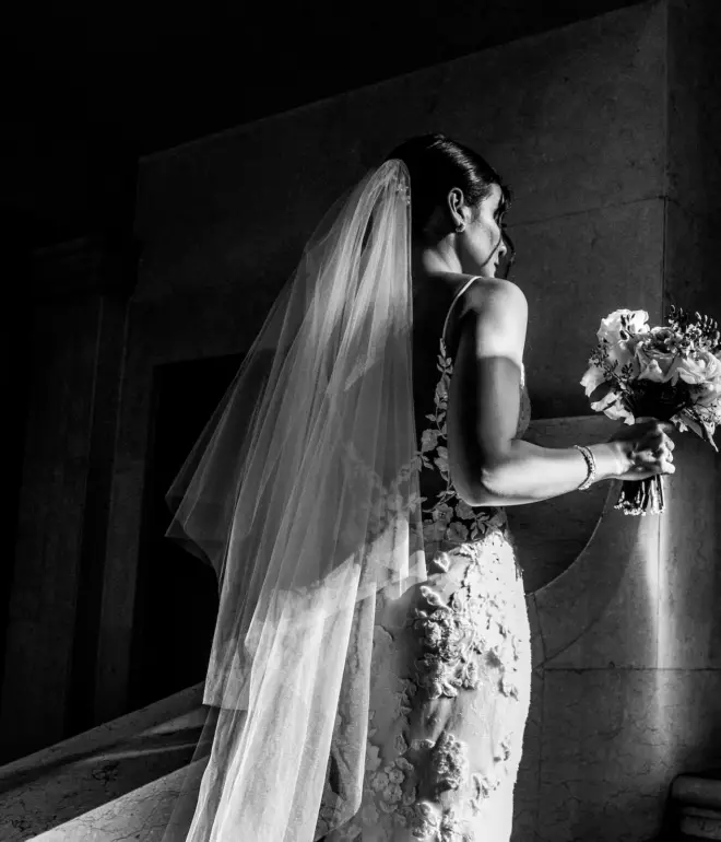 Documentary photographer bride walking up stairs